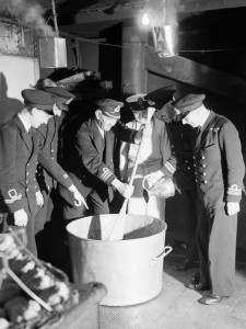 pud The Commander of a destroyer depot ship in the Home Fleet at Scapa Flow stirring the Christmas pudding,
