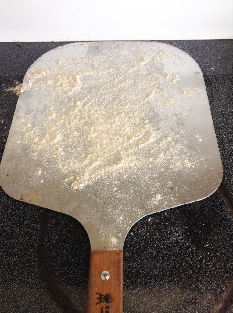 French Bread Pizza Peel Dusted with Whole Wheat Flour