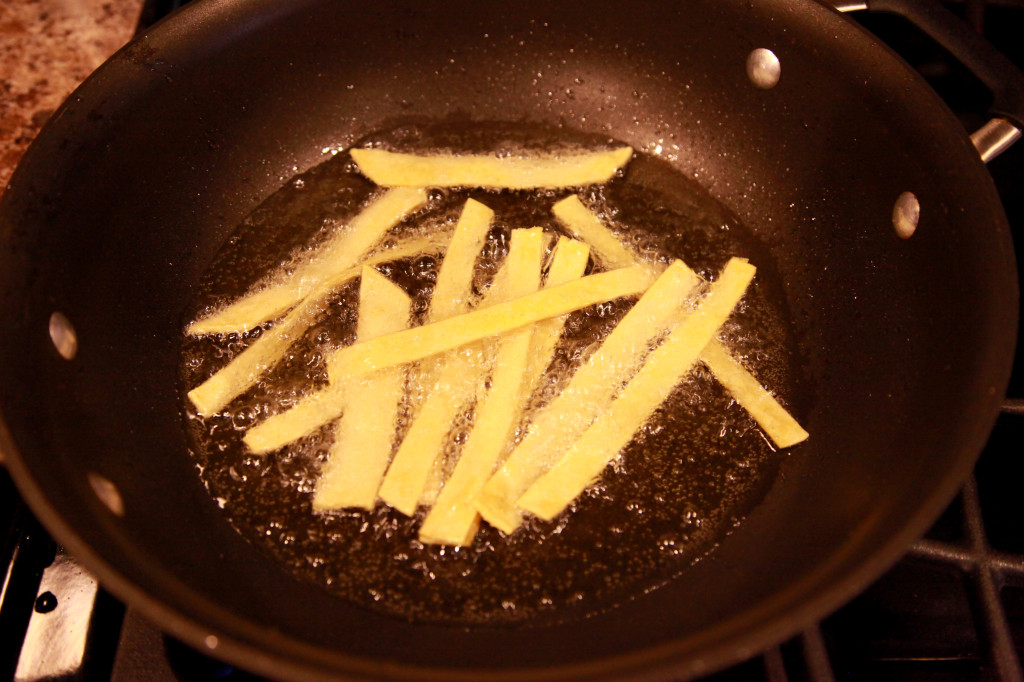 frying tortillas