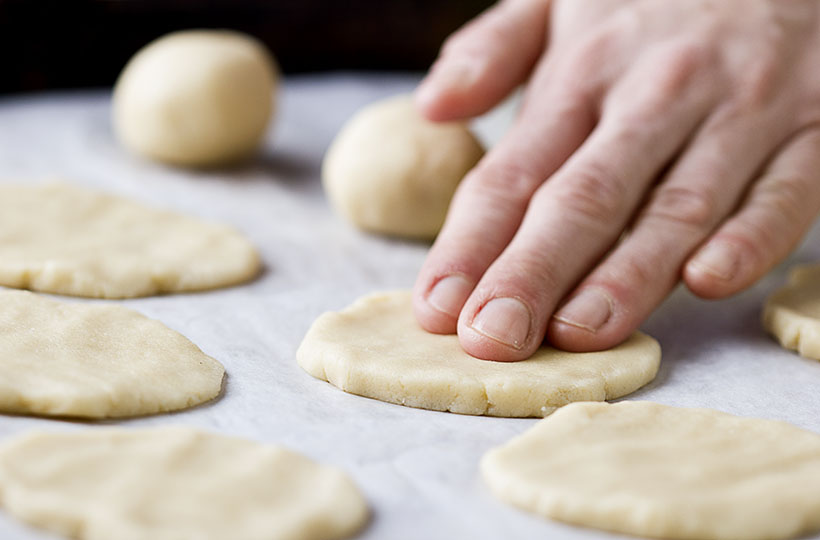 patting-dough-for-snowman-cookies