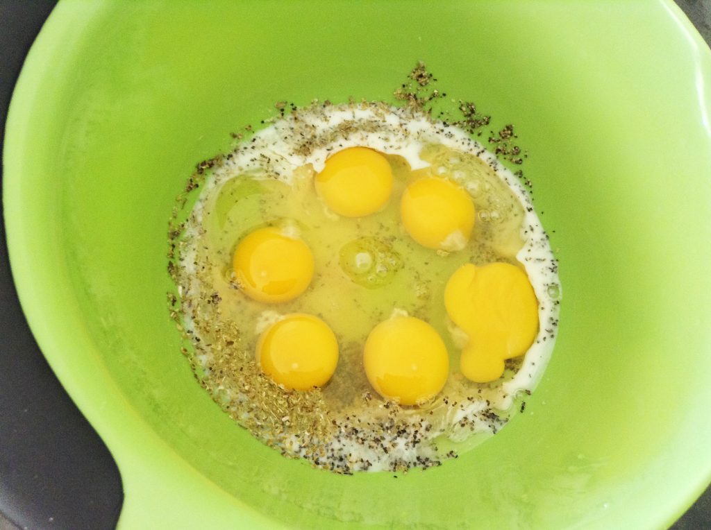 Crock Pot Breakfast Casserole seasoning with eggs