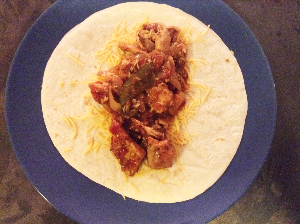 Crock Pot Fajitas fajita mixture added to tortilla