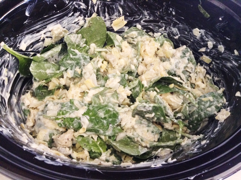 Spinach and Artichoke Dip mixture in crock pot after mixing